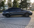 Сірий Міцубісі Lancer, об'ємом двигуна 1.58 л та пробігом 232 тис. км за 2899 $, фото 11 на Automoto.ua