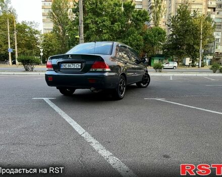 Серый Мицубиси Лансер, объемом двигателя 1.6 л и пробегом 223 тыс. км за 3900 $, фото 8 на Automoto.ua