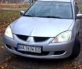 Сірий Міцубісі Lancer, об'ємом двигуна 1.6 л та пробігом 213 тис. км за 4400 $, фото 1 на Automoto.ua