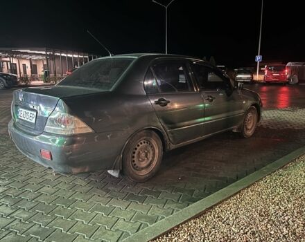 Серый Мицубиси Лансер, объемом двигателя 1.6 л и пробегом 269 тыс. км за 2999 $, фото 2 на Automoto.ua