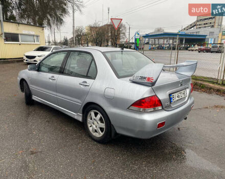 Сірий Міцубісі Lancer, об'ємом двигуна 1.6 л та пробігом 171 тис. км за 4600 $, фото 5 на Automoto.ua