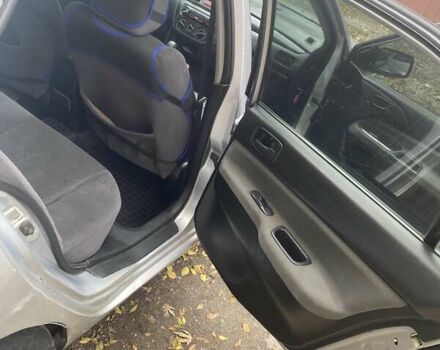 Мицубиси Лансер 2003 в Белой Церкве на Automoto.ua Серый Мицубиси Лансер, объемом двигателя 1.58 л и пробегом 350 тыс. км за 3300 $, фото 10 на Automoto.ua