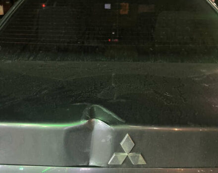 Сірий Міцубісі Lancer, об'ємом двигуна 1.58 л та пробігом 232 тис. км за 2899 $, фото 4 на Automoto.ua