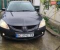 Сірий Міцубісі Lancer, об'ємом двигуна 1.6 л та пробігом 260 тис. км за 2799 $, фото 2 на Automoto.ua