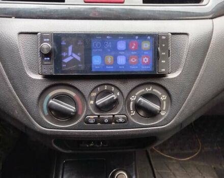 Серый Мицубиси Лансер, объемом двигателя 1.6 л и пробегом 260 тыс. км за 2750 $, фото 6 на Automoto.ua