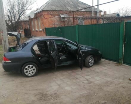 Сірий Міцубісі Lancer, об'ємом двигуна 1.6 л та пробігом 345 тис. км за 0 $, фото 2 на Automoto.ua