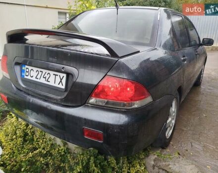 Сірий Міцубісі Lancer, об'ємом двигуна 1.6 л та пробігом 260 тис. км за 2799 $, фото 1 на Automoto.ua