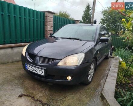 Серый Мицубиси Лансер, объемом двигателя 1.6 л и пробегом 260 тыс. км за 2750 $, фото 3 на Automoto.ua