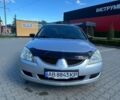 Сірий Міцубісі Lancer, об'ємом двигуна 1.58 л та пробігом 230 тис. км за 2450 $, фото 1 на Automoto.ua