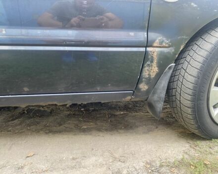 Серый Мицубиси Лансер, объемом двигателя 1.6 л и пробегом 360 тыс. км за 3000 $, фото 1 на Automoto.ua