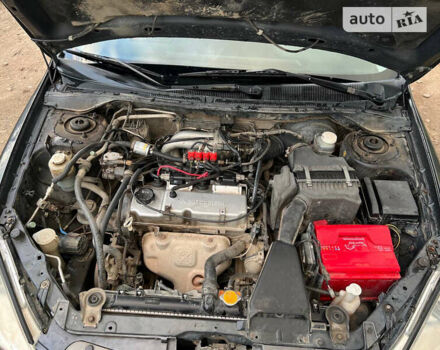 Сірий Міцубісі Lancer, об'ємом двигуна 1.58 л та пробігом 232 тис. км за 2899 $, фото 27 на Automoto.ua