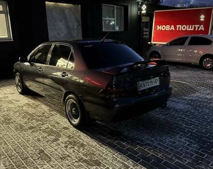 Сірий Міцубісі Lancer, об'ємом двигуна 1.6 л та пробігом 272 тис. км за 5100 $, фото 4 на Automoto.ua