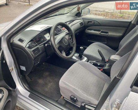 Сірий Міцубісі Lancer, об'ємом двигуна 1.6 л та пробігом 171 тис. км за 4600 $, фото 7 на Automoto.ua