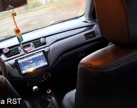 Сірий Міцубісі Lancer, об'ємом двигуна 1.6 л та пробігом 213 тис. км за 4400 $, фото 3 на Automoto.ua