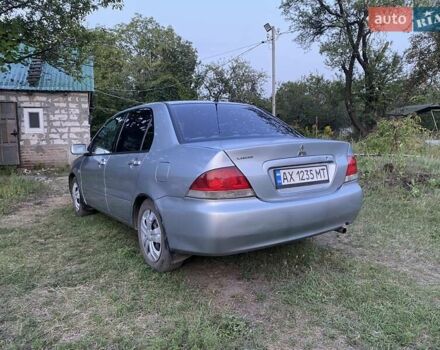 Серый Мицубиси Лансер, объемом двигателя 1.58 л и пробегом 390 тыс. км за 4400 $, фото 6 на Automoto.ua