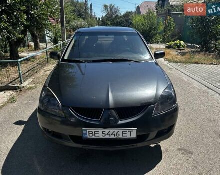 Серый Мицубиси Лансер, объемом двигателя 1.6 л и пробегом 250 тыс. км за 3800 $, фото 3 на Automoto.ua