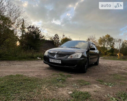 Сірий Міцубісі Lancer, об'ємом двигуна 1.58 л та пробігом 232 тис. км за 2899 $, фото 21 на Automoto.ua