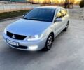 Серый Мицубиси Лансер, объемом двигателя 1.6 л и пробегом 330 тыс. км за 4500 $, фото 1 на Automoto.ua