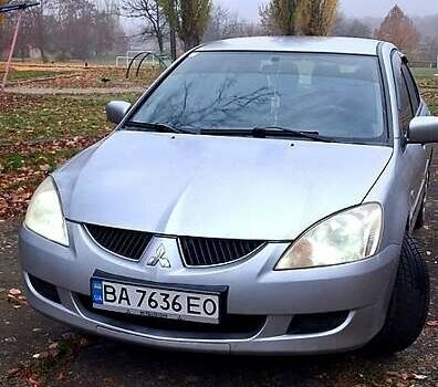 Сірий Міцубісі Lancer, об'ємом двигуна 1.6 л та пробігом 213 тис. км за 4400 $, фото 4 на Automoto.ua