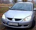 Сірий Міцубісі Lancer, об'ємом двигуна 1.6 л та пробігом 213 тис. км за 4400 $, фото 4 на Automoto.ua