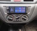 Сірий Міцубісі Lancer, об'ємом двигуна 1.6 л та пробігом 260 тис. км за 2799 $, фото 8 на Automoto.ua