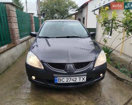 Серый Мицубиси Лансер, объемом двигателя 1.6 л и пробегом 260 тыс. км за 2750 $, фото 9 на Automoto.ua