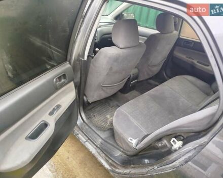 Серый Мицубиси Лансер, объемом двигателя 1.6 л и пробегом 260 тыс. км за 2750 $, фото 4 на Automoto.ua