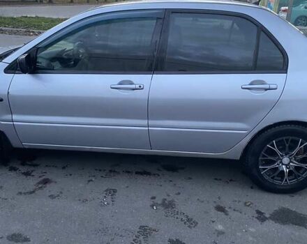 Мицубиси Лансер 2003 в Белой Церкве на Automoto.ua Серый Мицубиси Лансер, объемом двигателя 1.58 л и пробегом 350 тыс. км за 3300 $, фото 6 на Automoto.ua