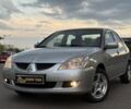 Сірий Міцубісі Lancer, об'ємом двигуна 1.6 л та пробігом 93 тис. км за 5024 $, фото 1 на Automoto.ua