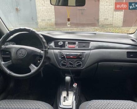 Мицубиси Лансер 2003 в Белой Церкве на Automoto.ua Серый Мицубиси Лансер, объемом двигателя 1.58 л и пробегом 350 тыс. км за 3300 $, фото 14 на Automoto.ua