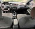 Сірий Міцубісі Lancer, об'ємом двигуна 1.58 л та пробігом 232 тис. км за 2899 $, фото 28 на Automoto.ua