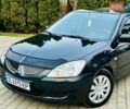 Сірий Міцубісі Lancer, об'ємом двигуна 1.6 л та пробігом 234 тис. км за 2950 $, фото 2 на Automoto.ua