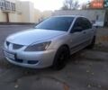 Сірий Міцубісі Lancer, об'ємом двигуна 1.6 л та пробігом 275 тис. км за 3400 $, фото 1 на Automoto.ua