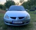 Сірий Міцубісі Lancer, об'ємом двигуна 1.6 л та пробігом 390 тис. км за 4400 $, фото 1 на Automoto.ua