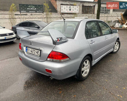 Сірий Міцубісі Lancer, об'ємом двигуна 1.6 л та пробігом 171 тис. км за 4600 $, фото 3 на Automoto.ua
