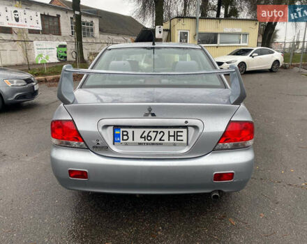Сірий Міцубісі Lancer, об'ємом двигуна 1.6 л та пробігом 171 тис. км за 4600 $, фото 4 на Automoto.ua