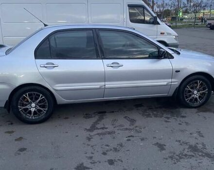 Мицубиси Лансер 2003 в Белой Церкве на Automoto.ua Серый Мицубиси Лансер, объемом двигателя 1.58 л и пробегом 350 тыс. км за 3300 $, фото 7 на Automoto.ua