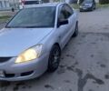 Мицубиси Лансер 2003 в Белой Церкве на Automoto.ua Серый Мицубиси Лансер, объемом двигателя 1.58 л и пробегом 350 тыс. км за 3300 $, фото 1 на Automoto.ua