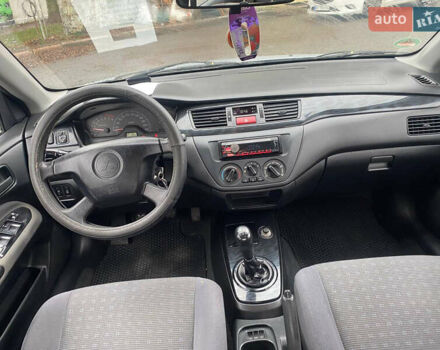 Сірий Міцубісі Lancer, об'ємом двигуна 1.6 л та пробігом 171 тис. км за 4600 $, фото 8 на Automoto.ua