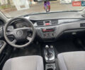 Сірий Міцубісі Lancer, об'ємом двигуна 1.6 л та пробігом 171 тис. км за 4600 $, фото 8 на Automoto.ua
