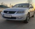 Сірий Міцубісі Lancer, об'ємом двигуна 1.58 л та пробігом 330 тис. км за 4500 $, фото 19 на Automoto.ua