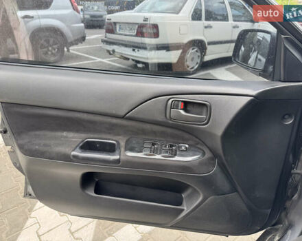 Сірий Міцубісі Lancer, об'ємом двигуна 1.6 л та пробігом 272 тис. км за 5100 $, фото 14 на Automoto.ua