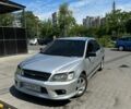 Сірий Міцубісі Lancer, об'ємом двигуна 2 л та пробігом 245 тис. км за 4900 $, фото 1 на Automoto.ua