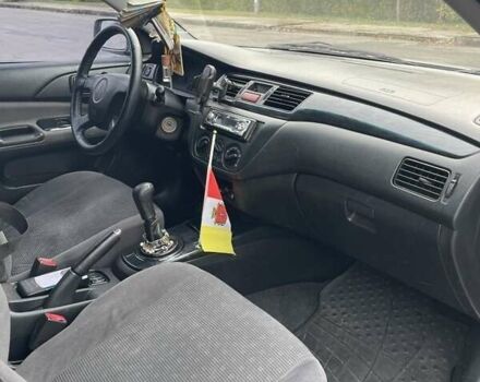 Сірий Міцубісі Lancer, об'ємом двигуна 1.6 л та пробігом 343 тис. км за 3850 $, фото 1 на Automoto.ua