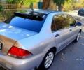 Сірий Міцубісі Lancer, об'ємом двигуна 1.6 л та пробігом 380 тис. км за 5200 $, фото 11 на Automoto.ua