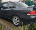 Сірий Міцубісі Lancer, об'ємом двигуна 1.6 л та пробігом 260 тис. км за 2799 $, фото 9 на Automoto.ua