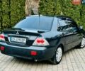 Сірий Міцубісі Lancer, об'ємом двигуна 1.6 л та пробігом 234 тис. км за 2950 $, фото 17 на Automoto.ua