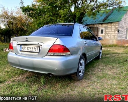 Серый Мицубиси Лансер, объемом двигателя 1.6 л и пробегом 390 тыс. км за 4400 $, фото 4 на Automoto.ua