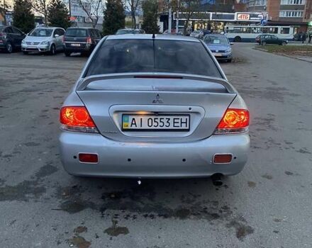 Мицубиси Лансер 2003 в Белой Церкве на Automoto.ua Серый Мицубиси Лансер, объемом двигателя 1.58 л и пробегом 350 тыс. км за 3300 $, фото 3 на Automoto.ua