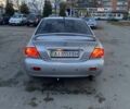 Мицубиси Лансер 2003 в Белой Церкве на Automoto.ua Серый Мицубиси Лансер, объемом двигателя 1.58 л и пробегом 350 тыс. км за 3300 $, фото 3 на Automoto.ua